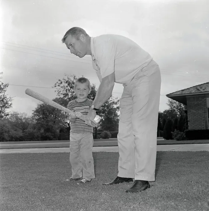 Framed Print : Mickey Mantle Holding Bat with Son