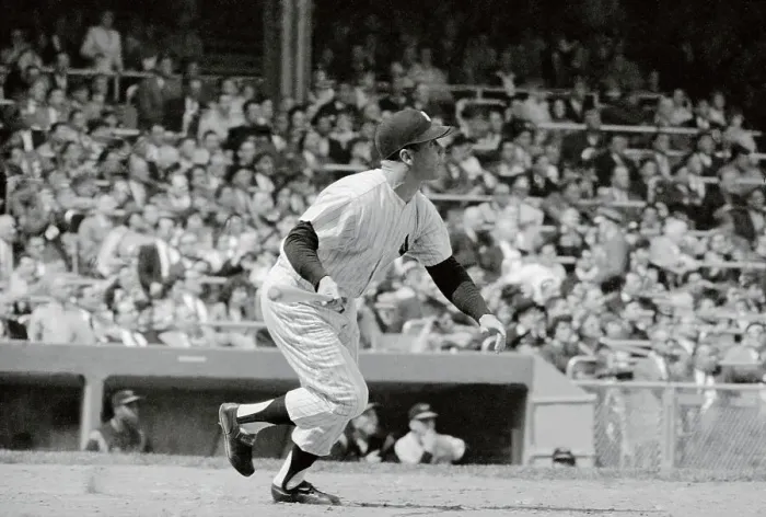 Framed Print : Mickey Mantle Losing Grip of Bat to Run Framed Print : Mickey Mantle Losing Grip of Bat to Run