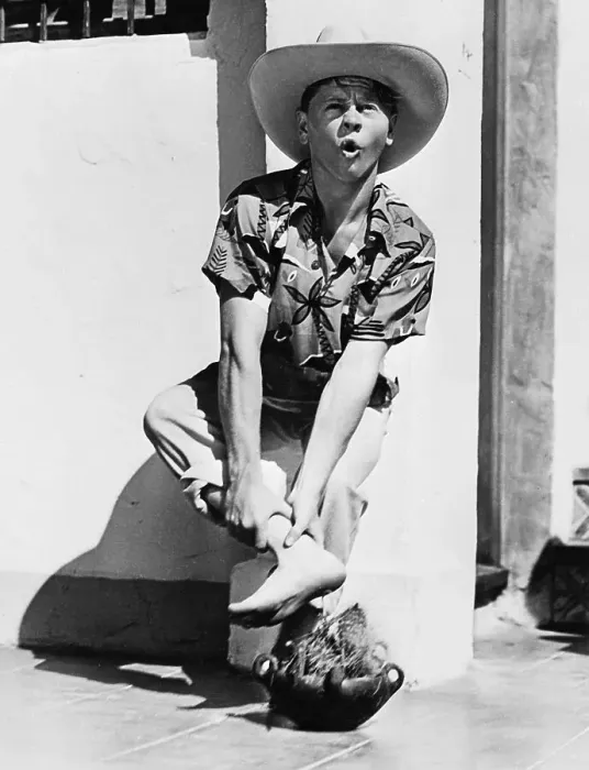Framed Print : Mickey Rooney Holding His Ankle Framed Print : Mickey Rooney Holding His Ankle