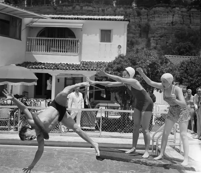 Framed Print : Mickey Rooney Being Pushed into a Pool Framed Print : Mickey Rooney Being Pushed into a Pool