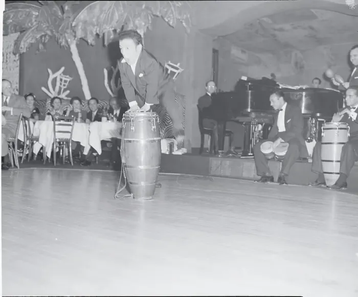 Framed Print : Midget Performing Stage Stunt with Band at the El Morocco