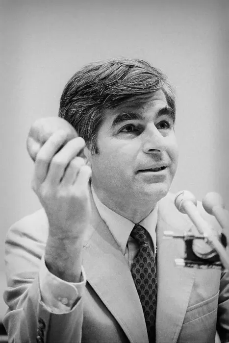 Framed Print : Mike Dukakis Holding Apple to Make His Point at Meeting Framed Print : Mike Dukakis Holding Apple to Make His Point at Meeting