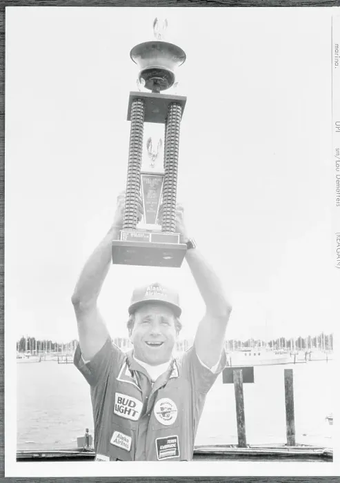 Framed Print : Mike Reagan Holding a Trophy Framed Print : Mike Reagan Holding a Trophy