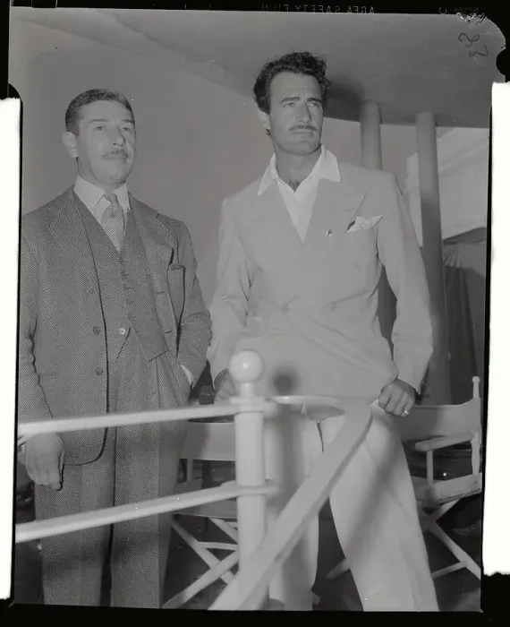 Framed Print : Mike Romanoff and Gilbert Roland Watching Tennis Framed Print : Mike Romanoff and Gilbert Roland Watching Tennis