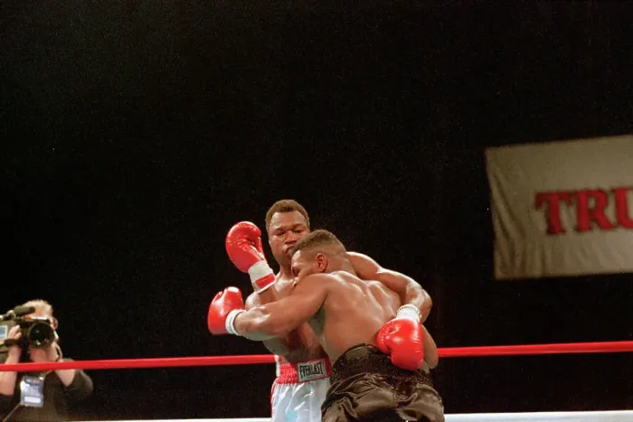 Framed Print : Mike Tyson Holds Larry Holmes Against Ropes Framed Print : Mike Tyson Holds Larry Holmes Against Ropes