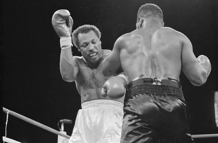 Framed Print : Mike Tyson Punches Pinklon Thomas Framed Print : Mike Tyson Punches Pinklon Thomas