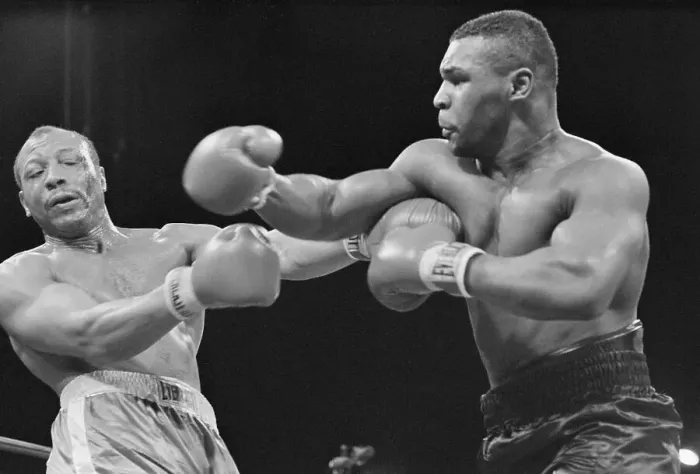 Framed Print : Mike Tyson Punching James Bonecrusher Smith Framed Print : Mike Tyson Punching James Bonecrusher Smith