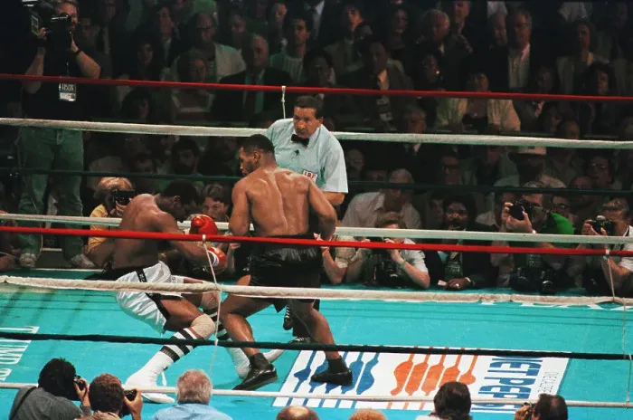 Framed Print : Mike Tyson Punching Michael Spinks