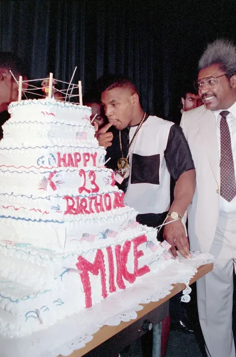 Framed Print : Mike Tyson Tastes Finger, Birthday Cake Frosting Framed Print : Mike Tyson Tastes Finger, Birthday Cake Frosting