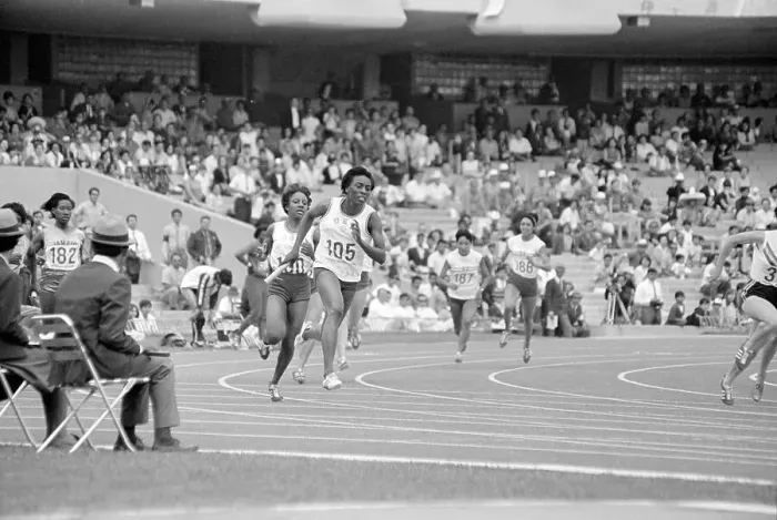 Framed Print : Mildrette Netter and Myomia Tyus in Relay Framed Print : Mildrette Netter and Myomia Tyus in Relay