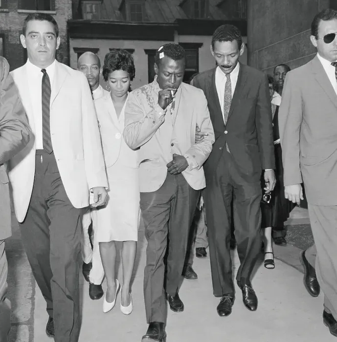 Framed Print : Miles Davis and Colleagues Exiting Courtroom Framed Print : Miles Davis and Colleagues Exiting Courtroom