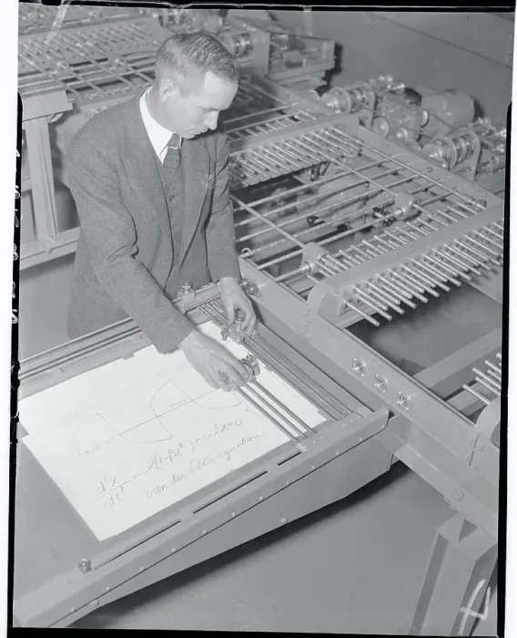 Framed Print : Miles Nelson Operating a Calculator Framed Print : Miles Nelson Operating a Calculator