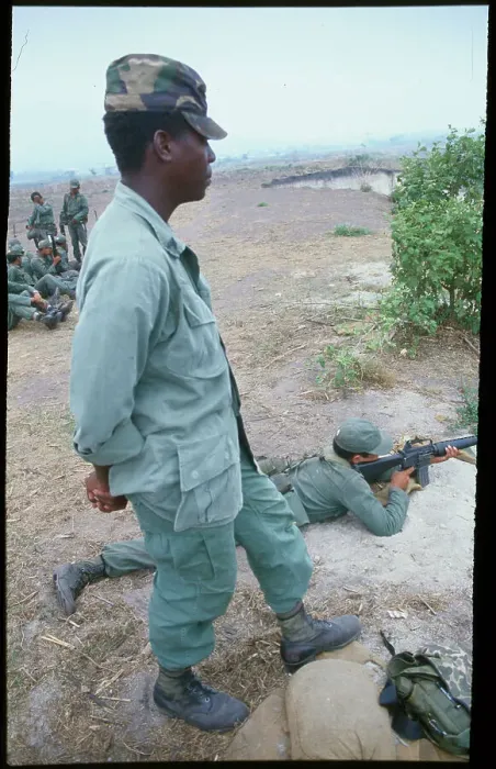 Framed Print : Military Advisor Checking Salvadorean Cadet at Firing Practice Framed Print : Military Advisor Checking Salvadorean Cadet at Firing Practice