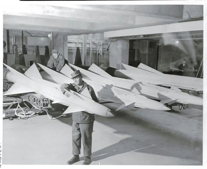 Framed Print : Military Man Working on Horizontal Missile Framed Print : Military Man Working on Horizontal Missile