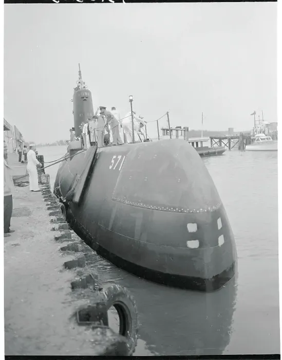 Framed Print : Military Men Atop Submarine at Pier Framed Print : Military Men Atop Submarine at Pier