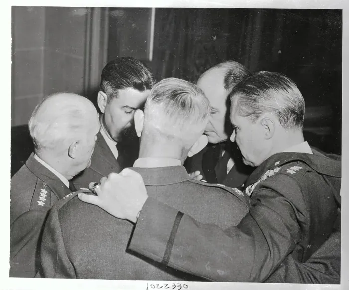 Framed Print : Military Men Gathered in a Huddle Framed Print : Military Men Gathered in a Huddle
