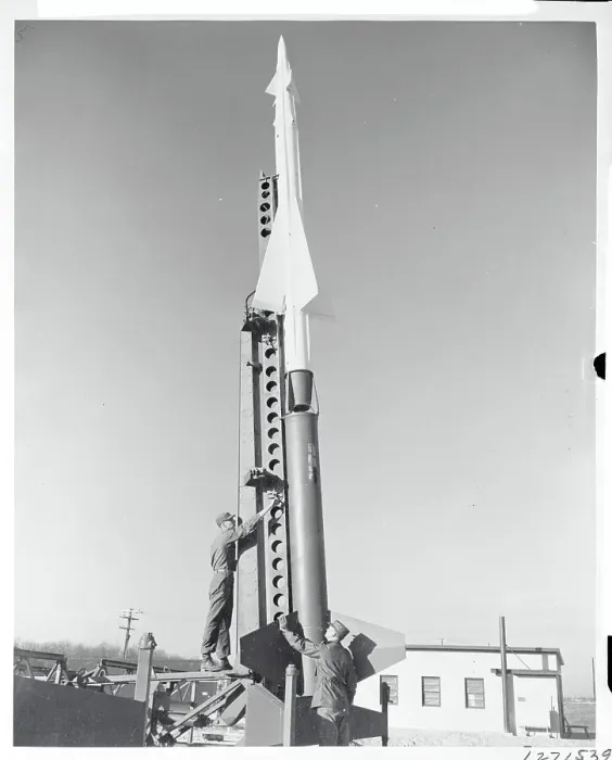 Framed Print : Military Men Working on Missile Framed Print : Military Men Working on Missile