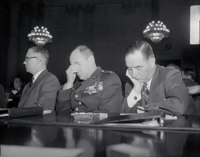 Framed Print : Military Officials Sitting and Looking Worried