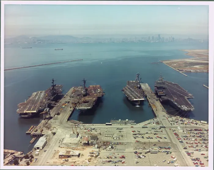 Framed Print : Military Plane Carriers near Docks Framed Print : Military Plane Carriers near Docks