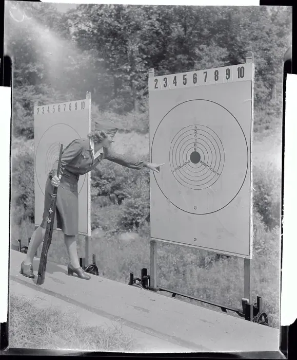 Framed Print : Military Woman Pointing to Target Chart Framed Print : Military Woman Pointing to Target Chart