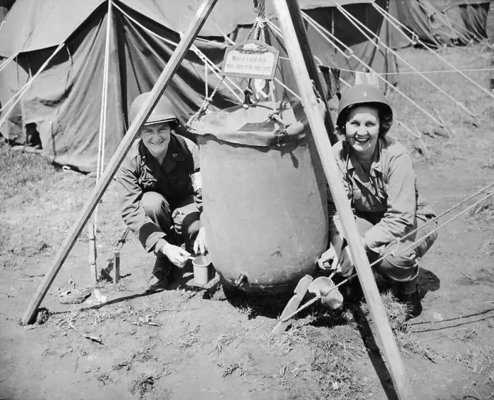 Framed Print : Military Women Sitting at Water Holder Framed Print : Military Women Sitting at Water Holder