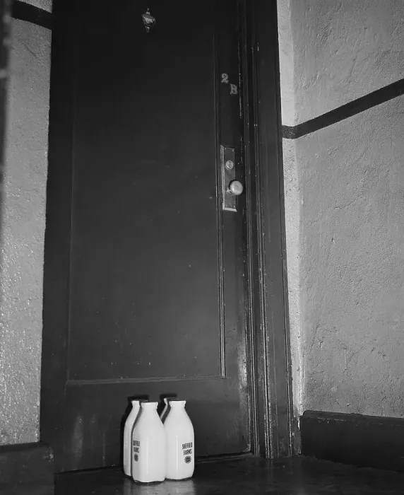 Framed Print : Milk Bottles at Door of Espionage Suspect