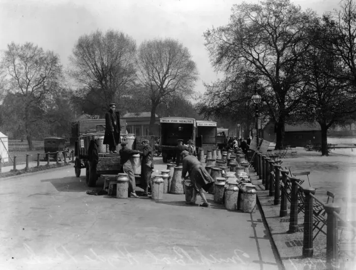 Framed Print : Milk Pool. May 1926: Volunteers load milk churns