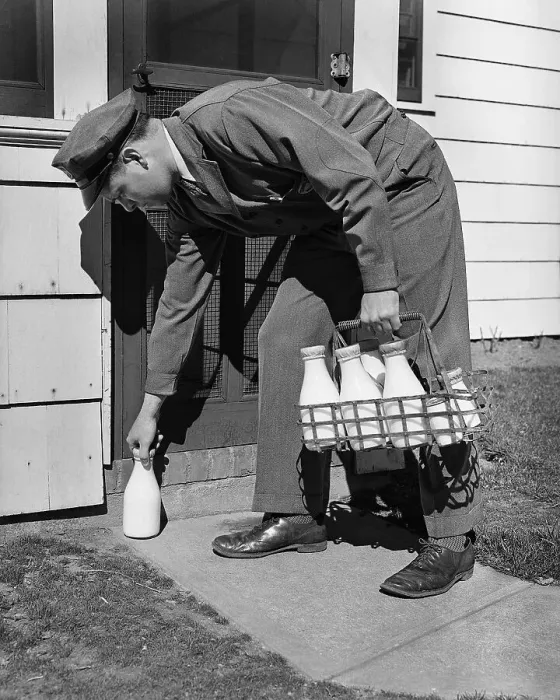 Framed Print : Milkman Leaving Milk Bottle on Doorstep Framed Print : Milkman Leaving Milk Bottle on Doorstep