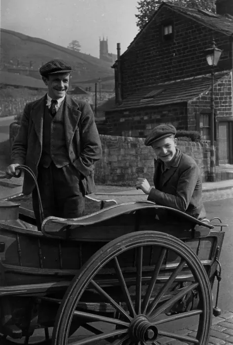 Framed Print : Milkmen. 30th June 1945: Two men delivering large churns of milk on a cart Framed Print : Milkmen. 30th June 1945: Two men delivering large churns of milk on a cart