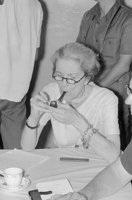 Framed Print : Millicent Fenwick Lighting a Pipe Framed Print : Millicent Fenwick Lighting a Pipe