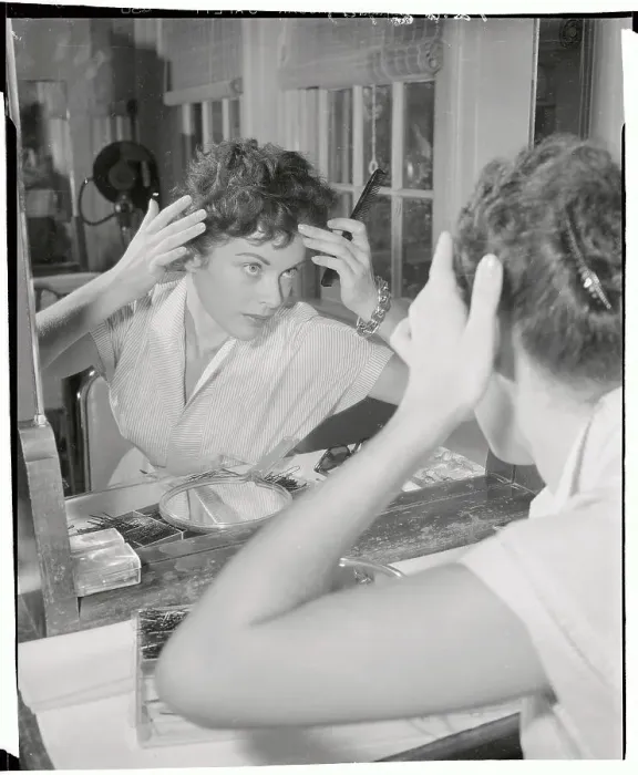 Framed Print : Milly Vitale Grooming Herself in Mirror