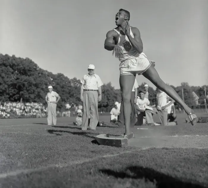 Framed Print : Milt Campbell in Shot Put Throwing Position