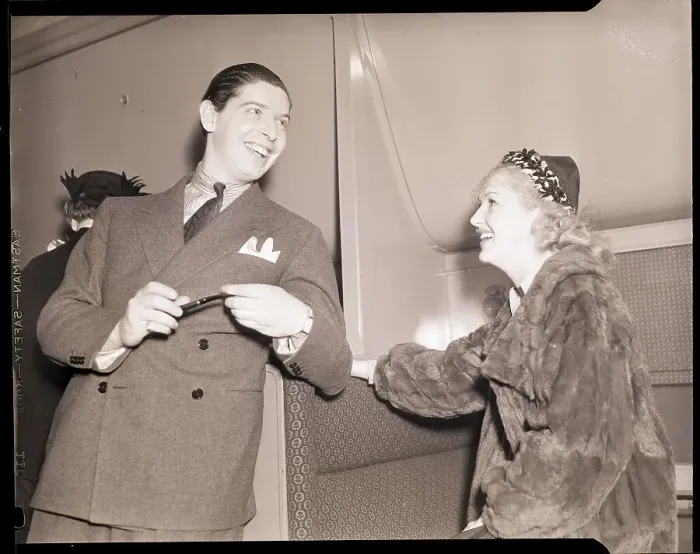 Framed Print : Milton Berle Greeted by Betty Grable Framed Print : Milton Berle Greeted by Betty Grable