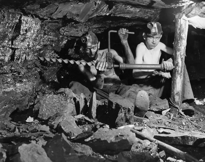 Framed Print : Miners. Two miners fixing a pit support in a mine Framed Print : Miners. Two miners fixing a pit support in a mine