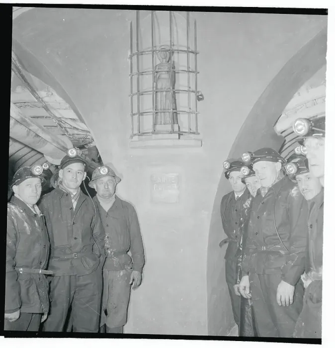 Framed Print : Miners Standing Around Statue Framed Print : Miners Standing Around Statue