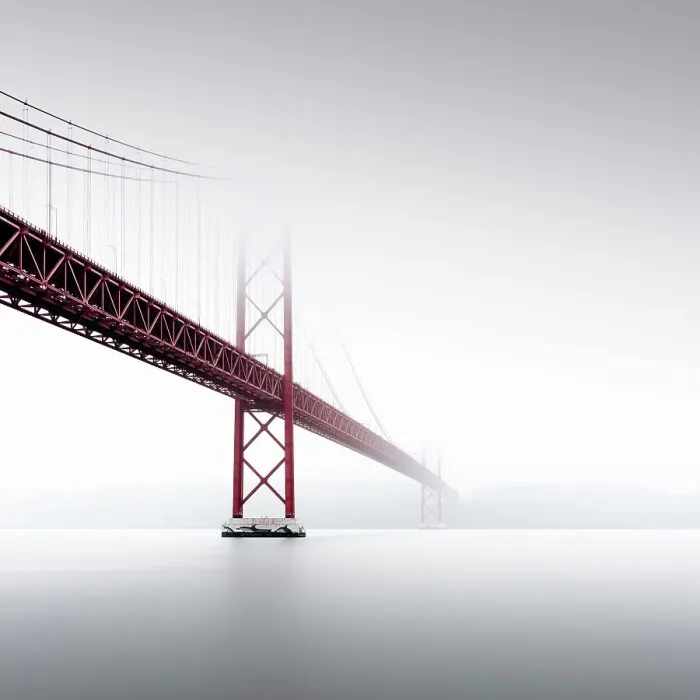 Framed Print : Minimalist long exposure of the Golden Gate Bridge's little sister. The Ponte 25 de Abril bridge over the Tagus River in Lisbon, Portugal Framed Print : Minimalist long exposure of the Golden Gate Bridge's little sister. The Ponte 25 de Abril bridge over the Tagus River in Lisbon, Portugal