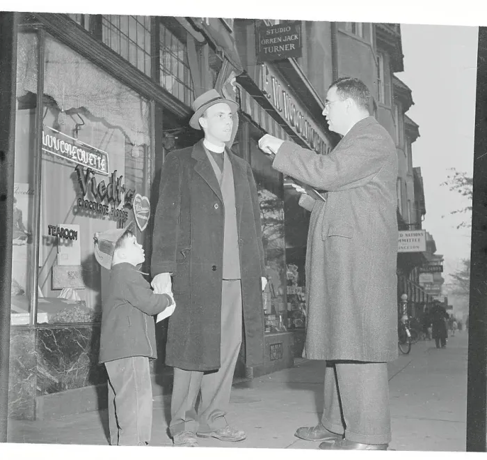 Framed Print : Minister and Young Boy Being Stopped by Reporter Framed Print : Minister and Young Boy Being Stopped by Reporter