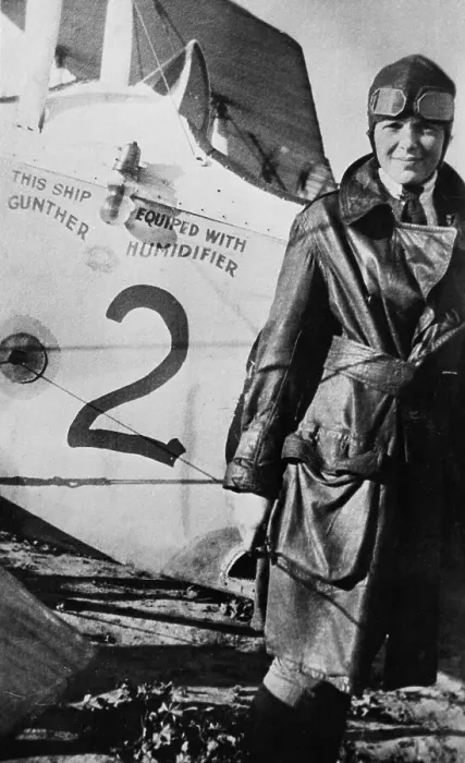 Framed Print : Miss Amelia Earhart Posing with Airplane Framed Print : Miss Amelia Earhart Posing with Airplane