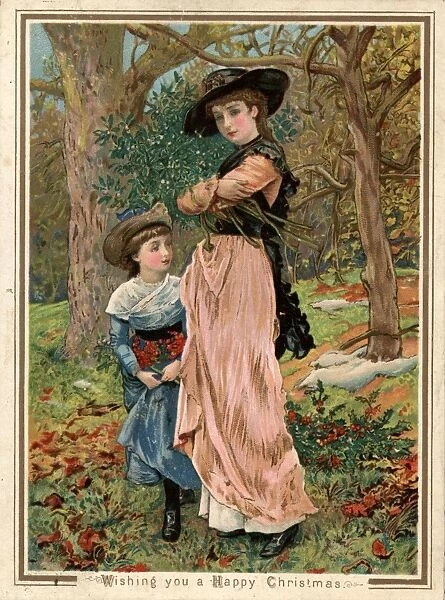 Mistletoe. circa 1870: Young girls collecting mistletoe in the woods