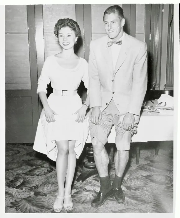 Framed Print : Mitzi Gaynor and Elroy Hirsch Exposing Their Legs for Camera