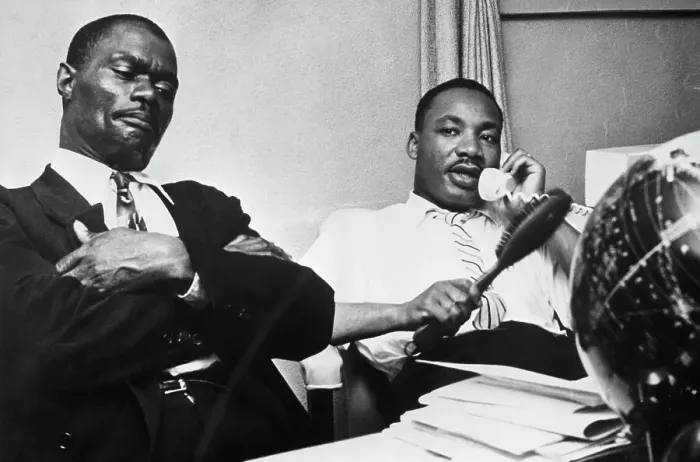 Framed Print : M.L. King Seated Talking On Telephone Framed Print : M.L. King Seated Talking On Telephone