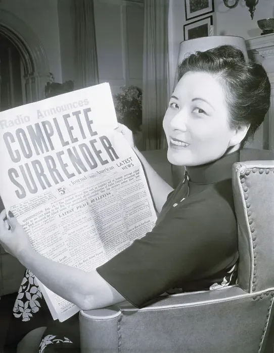 Framed Print : Mme. Chiang Kai-Shek Looking At Headline Framed Print : Mme. Chiang Kai-Shek Looking At Headline