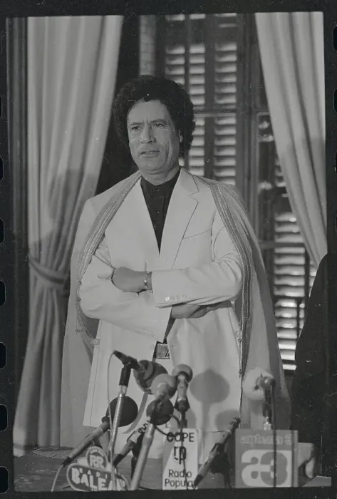 Framed Print : Moammar Khadafy Standing with His Arms Folded Framed Print : Moammar Khadafy Standing with His Arms Folded