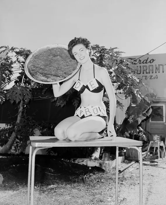 Framed Print : Model Holding Pizza Pie