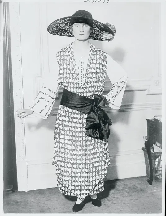 Framed Print : Model Posing in Feminine Dress and Hat Framed Print : Model Posing in Feminine Dress and Hat