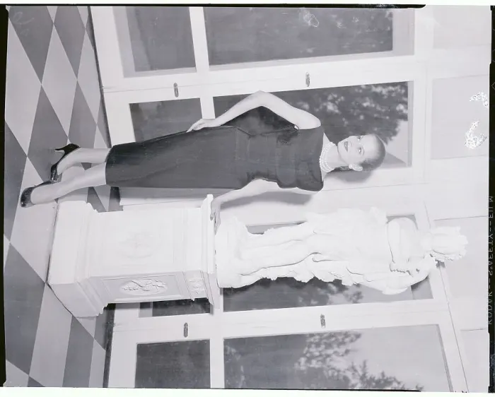 Framed Print : Model Posing by Large Statue Framed Print : Model Posing by Large Statue