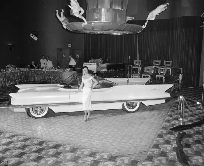 Framed Print : Model Standing Next to Lincoln Futura Automobile Framed Print : Model Standing Next to Lincoln Futura Automobile