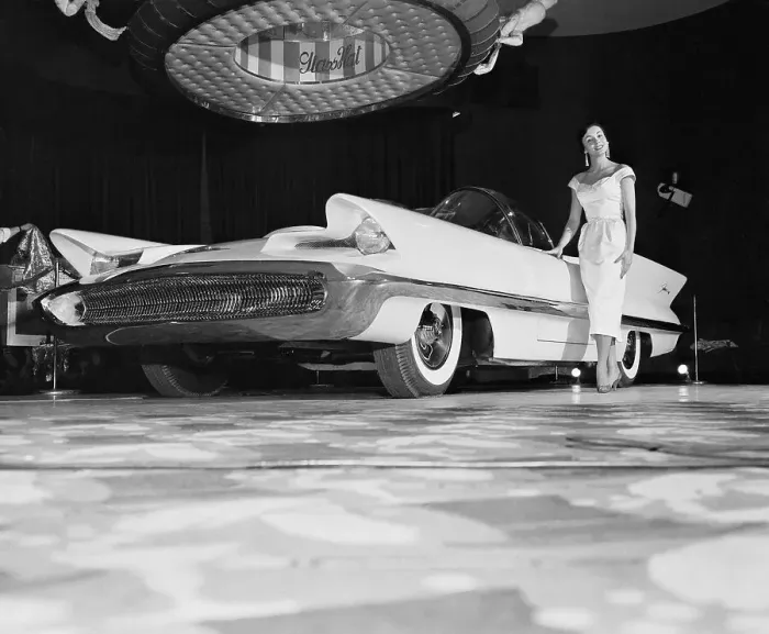 Framed Print : Model Standing Next to the New Futura Automobile Framed Print : Model Standing Next to the New Futura Automobile