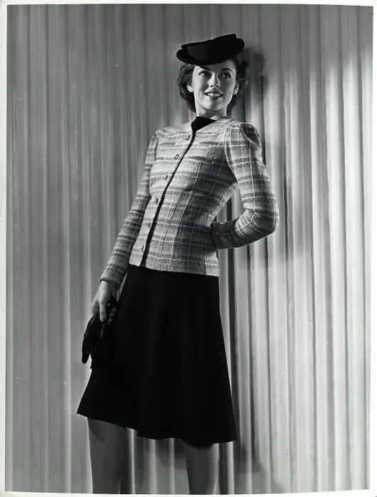 Framed Print : Model Wearing Black Dress with Plaid Coat Framed Print : Model Wearing Black Dress with Plaid Coat