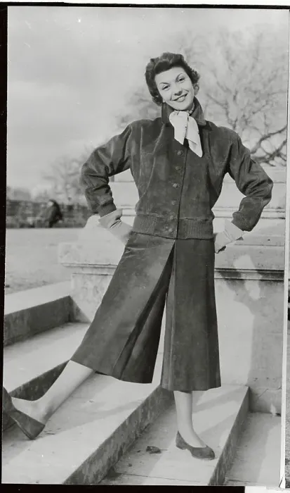 Framed Print : Model Wearing Suede Skirt-Pants and Jacket Framed Print : Model Wearing Suede Skirt-Pants and Jacket